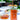 Pure Southern Honey Without Comb in Glass Jar 16oz with blurred Decoration Background over a table