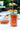Pure Southern Honey Without Comb in Glass Jar 16oz with blurred Decoration Background over a table